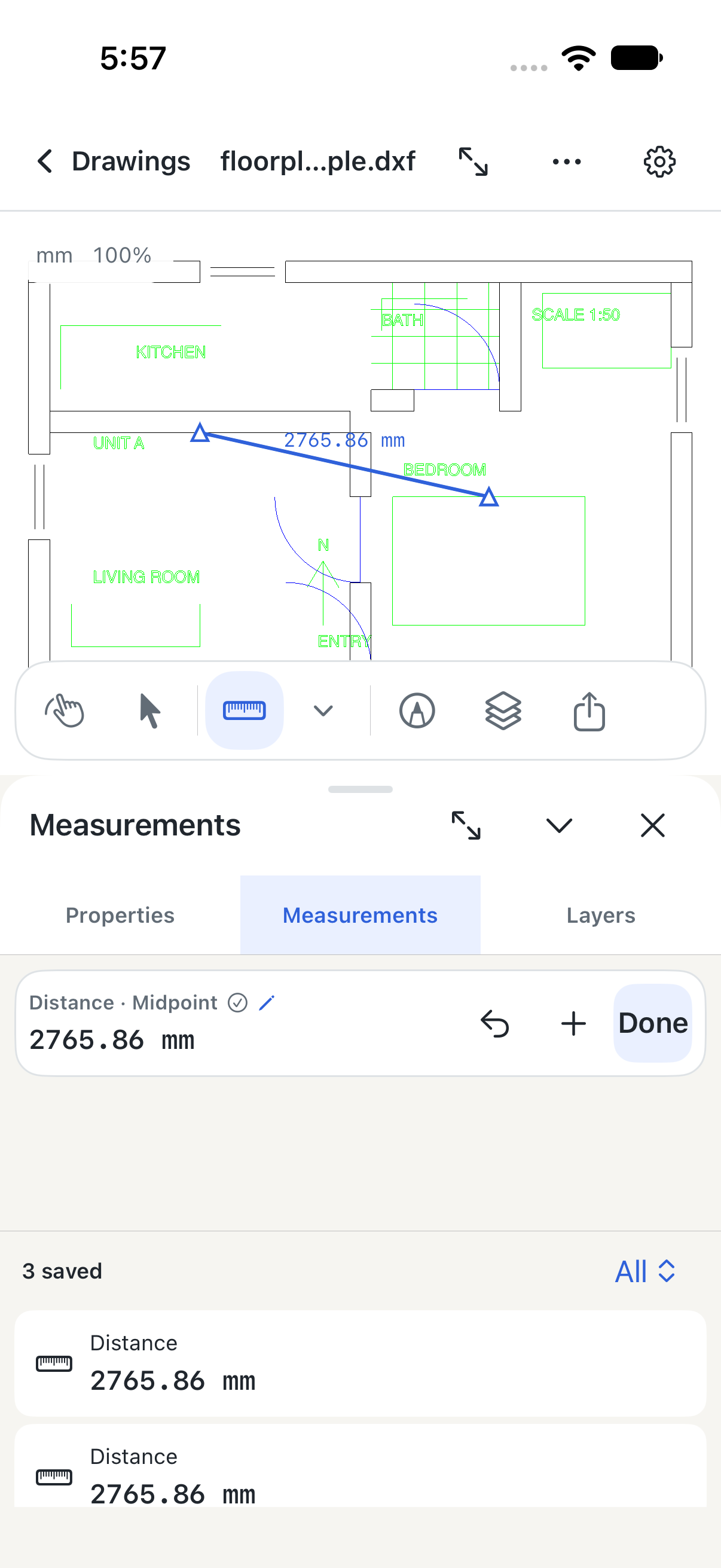Development build on iPhone showing a 2765.86 mm distance and the saved measurement list
